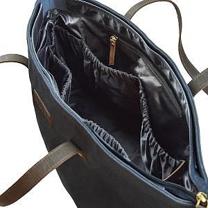 Inside view of the Navy Wax and Dark Brown Diaper Bag by O My Bag.