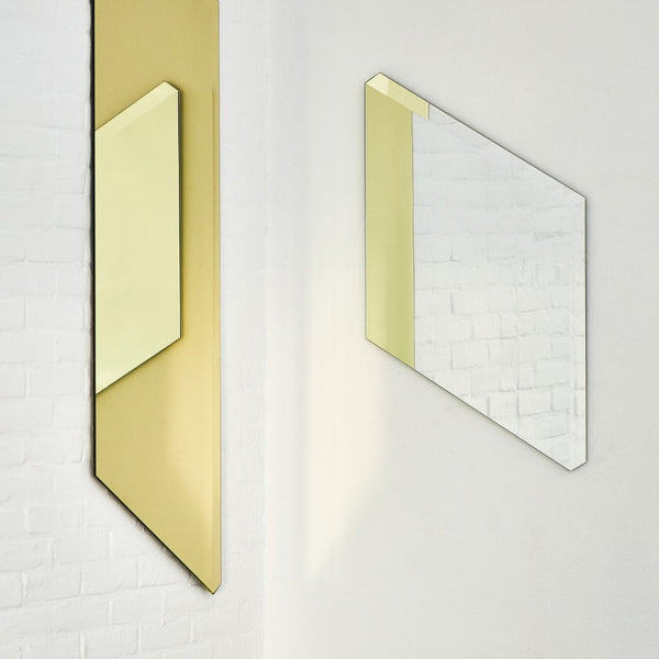 Facett Mirrors by Puik reflecting light off of each other.