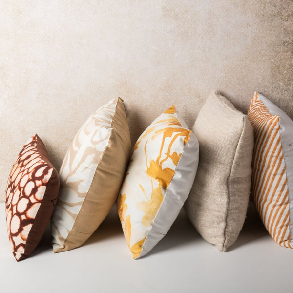 Five cushions from Urban Nature Culture. The Sado Cushion is at the front of the line.