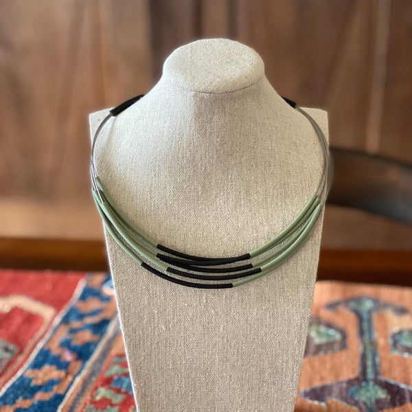 NECKLACE OF 6 STAINLESS STEEL STRINGS AND COLORFUL RUBBER TUBES